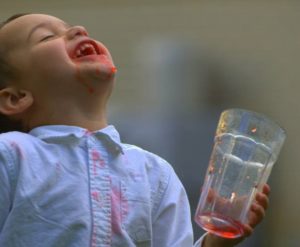 Kid drinking Kool-Aid